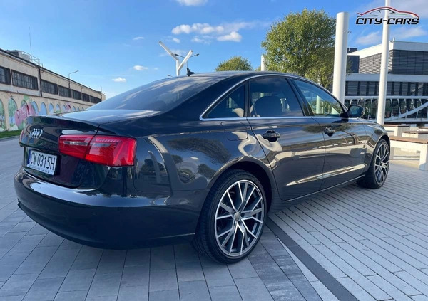 Audi A6 cena 77600 przebieg: 215000, rok produkcji 2014 z Sejny małe 529